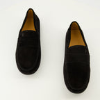 Imagen de los mocasines City gommino de Tod's para Hombre - Temporada Otoño-Invierno 2025 - Vista aérea de un par de zapatos