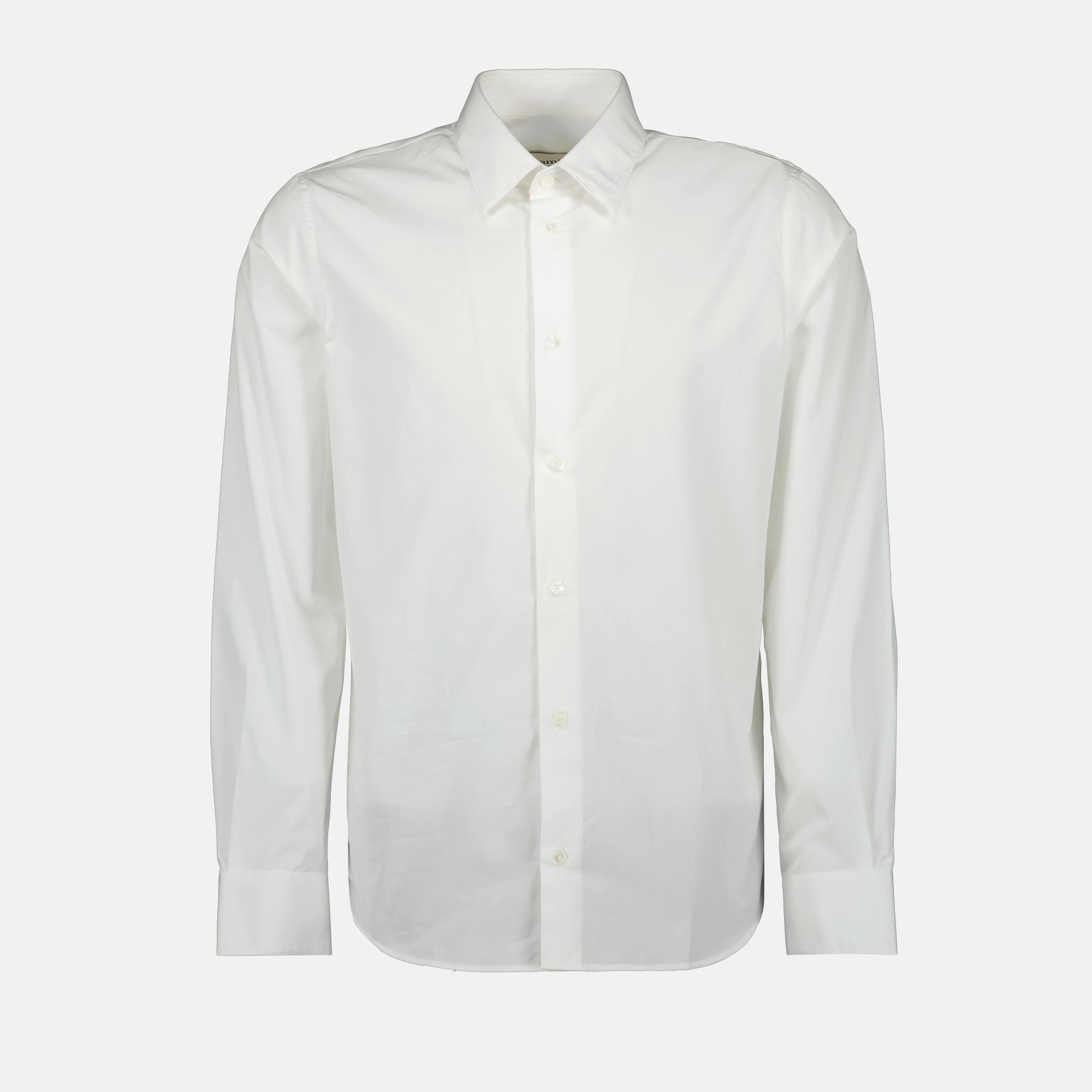 Image of the white Ami heart shirt from the brand Ami PARIS for Men - Autumn-Winter Season 2025 - Front View