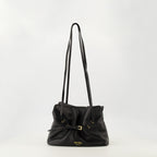 Imagen del pequeño bolso Dada de cuero negro de la marca Prada para Mujer - Temporada Otoño-Invierno 2025 - Vista Frontal