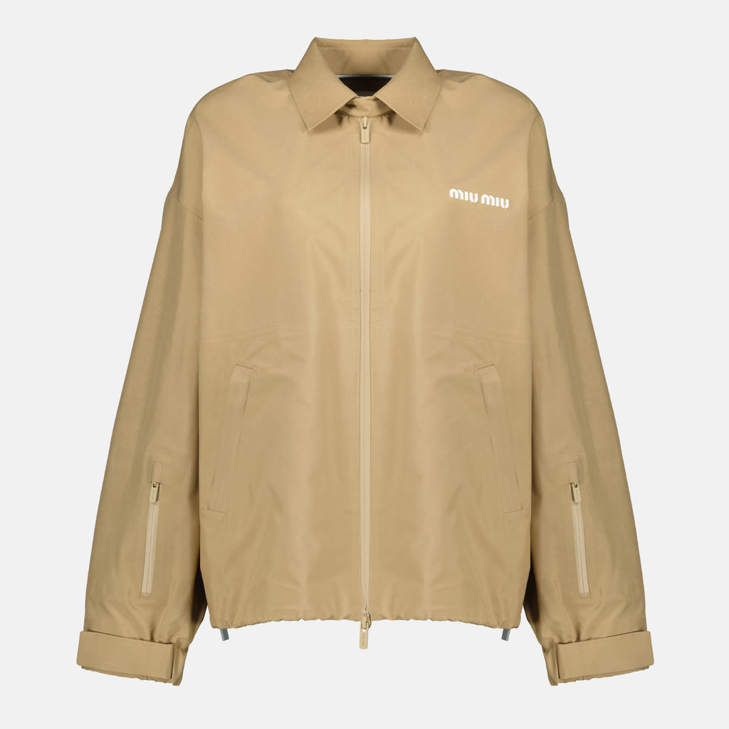 Image de l'article Coupe-vent beige de la marque Miu Miu pour Femme - Saison Printemps-Été 2026 - Vue de Face