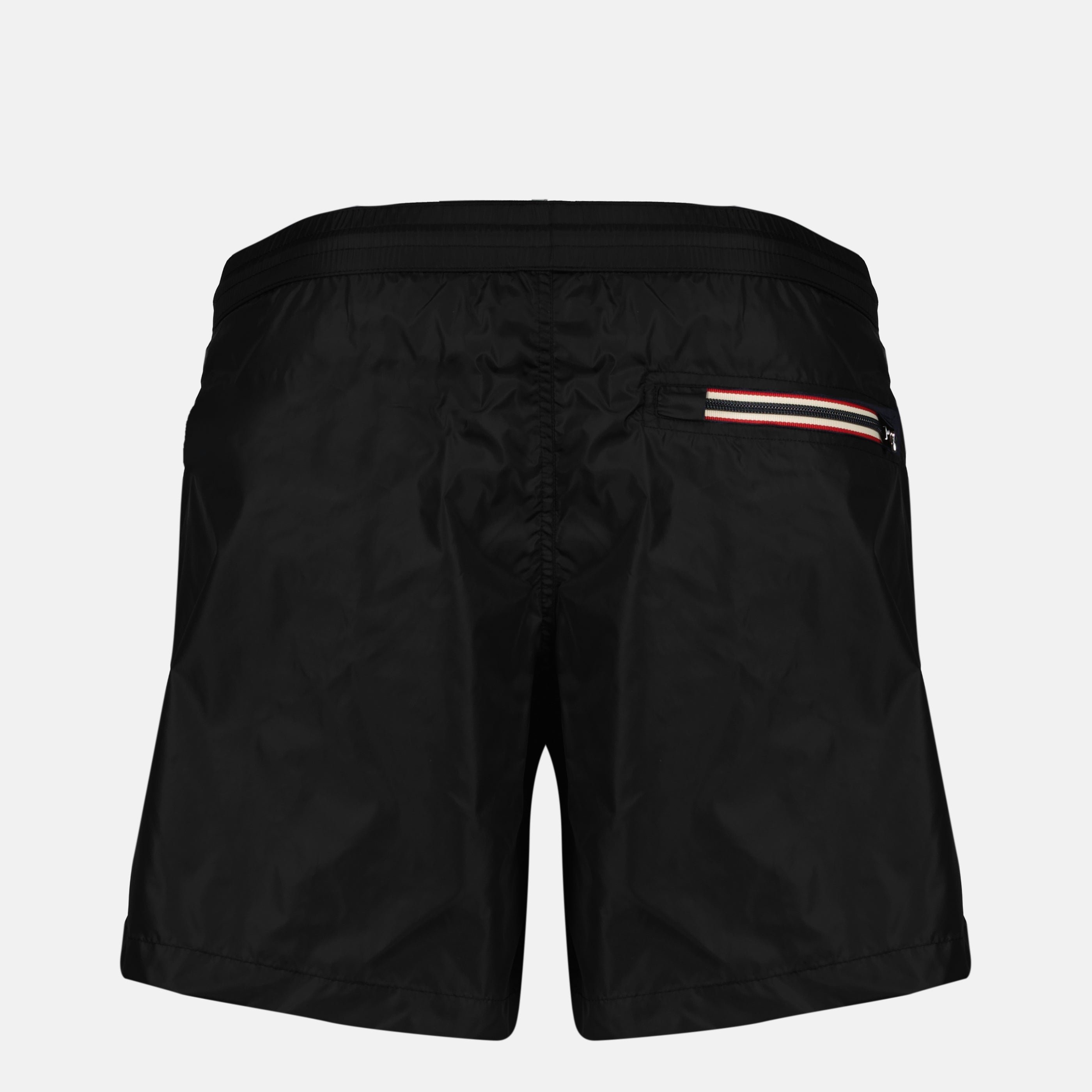 Image of the black logo nylon swim shorts by Moncler for Men - Spring-Summer 2026 - Back View