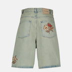 Immagine dei pantaloni corti Dusty ricamati con fiori in denim blu del marchio Drole De Monsieur per Uomo - Collezione Primavera-Estate 2026 - Vista Posteriore