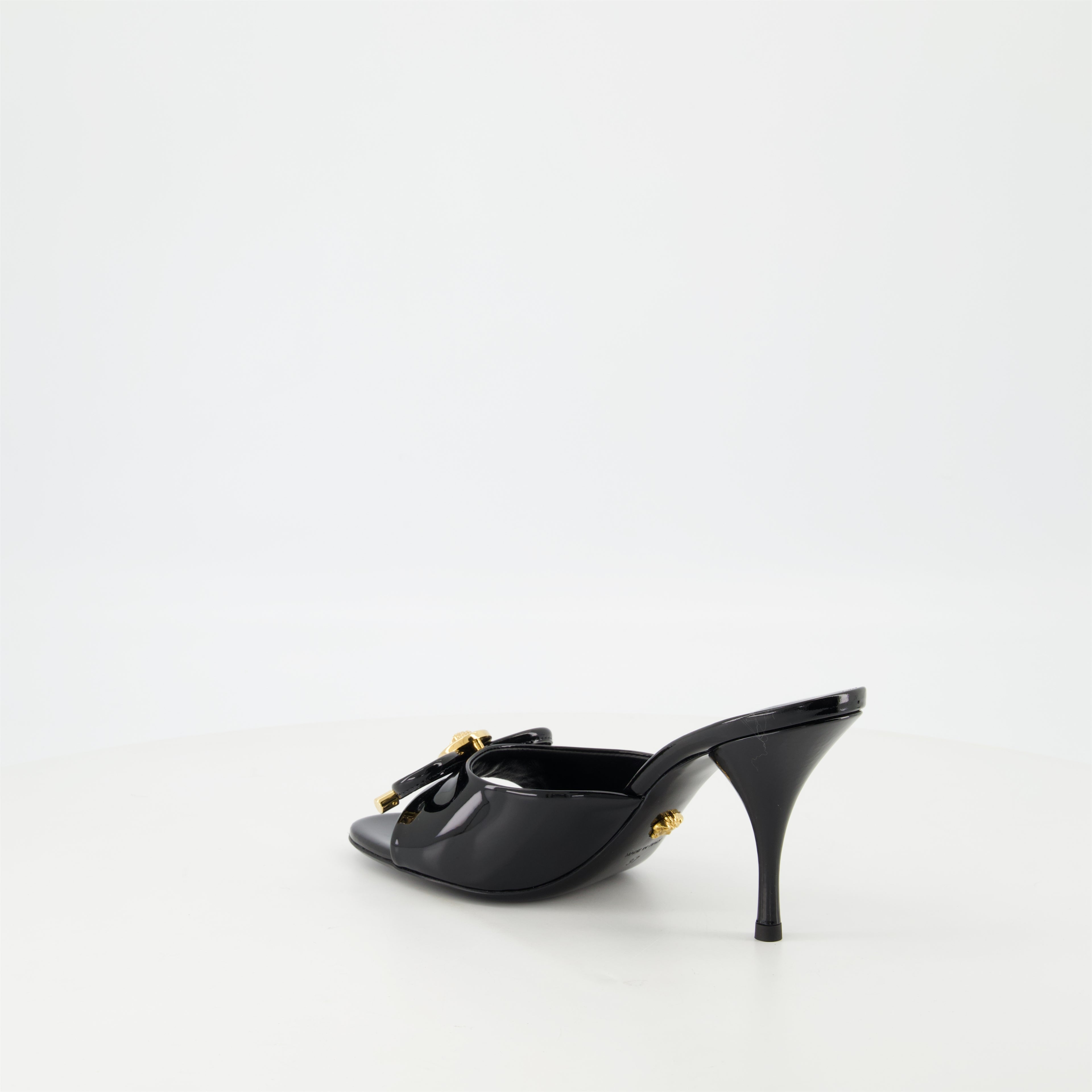 Open shoes Bow Heeled Mules Versace Black Femme