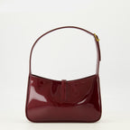 Image of the article Le 5 à 7 burgundy patent leather bag by Saint Laurent for Women - Autumn-Winter 2025 - Back View