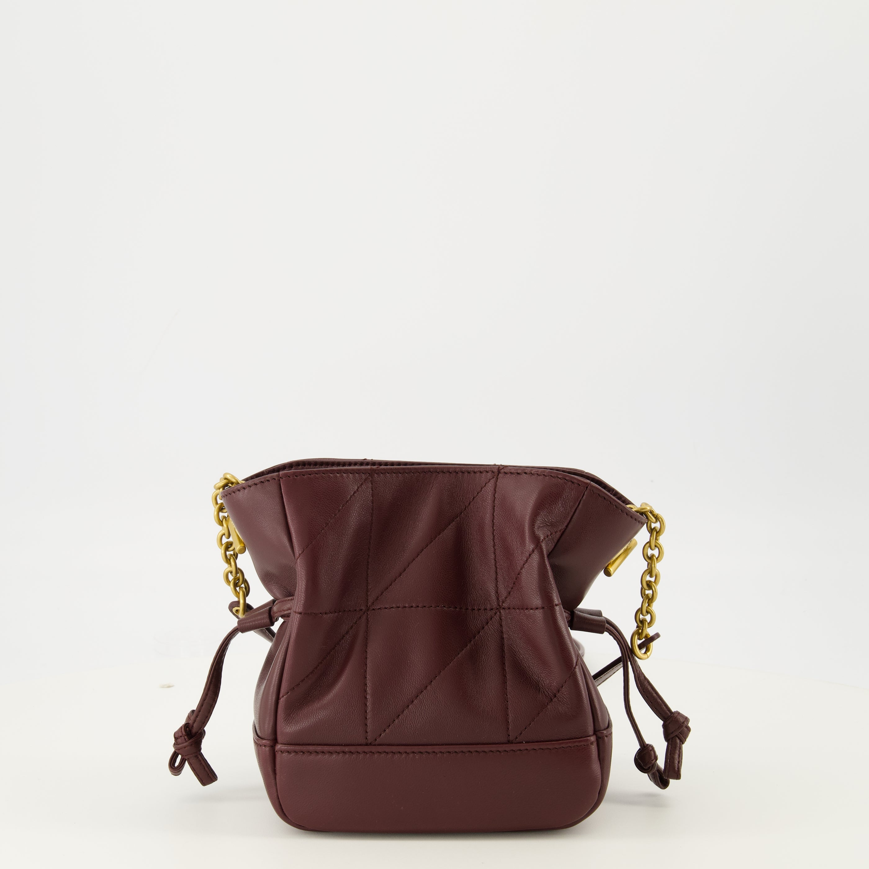 Image of the Saint Laurent women's Jamie mini bucket bag in burgundy leather - Spring-Summer 2026 season - Back view