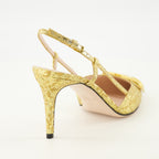 Imagem do sapato de salto Vlogo em tecido dourado da marca Valentino Garavani para Mulheres - Temporada Primavera-Verão 2026 - Vista traseira