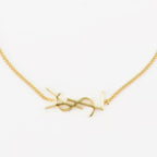 Imagen del brazalete Cassandre dorado de la marca Saint Laurent para Hombre - Temporada Primavera-Verano 2022 - Vista Detallada_2