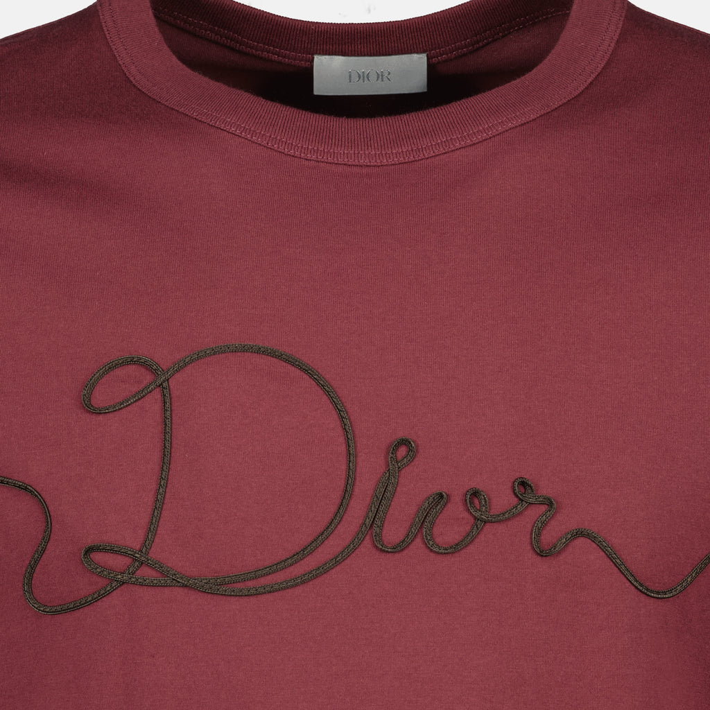 Image of the Dior Ribbon burgundy T-shirt from the Dior brand for Men - Spring-Summer 2026 - Detailed View_1