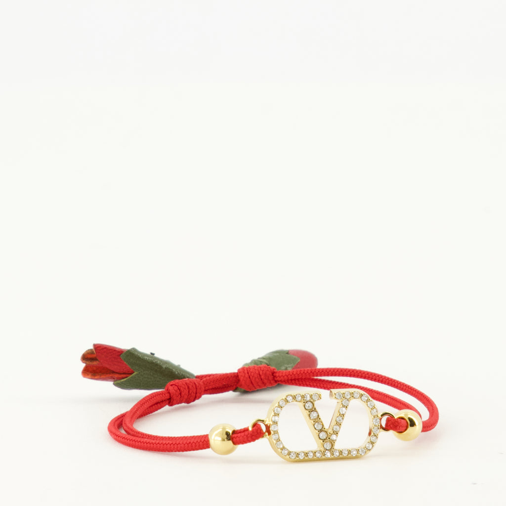 Image of the Vlogo bracelet with red cord by Valentino Garavani for Women - Spring-Summer 2026 - Detailed View_2