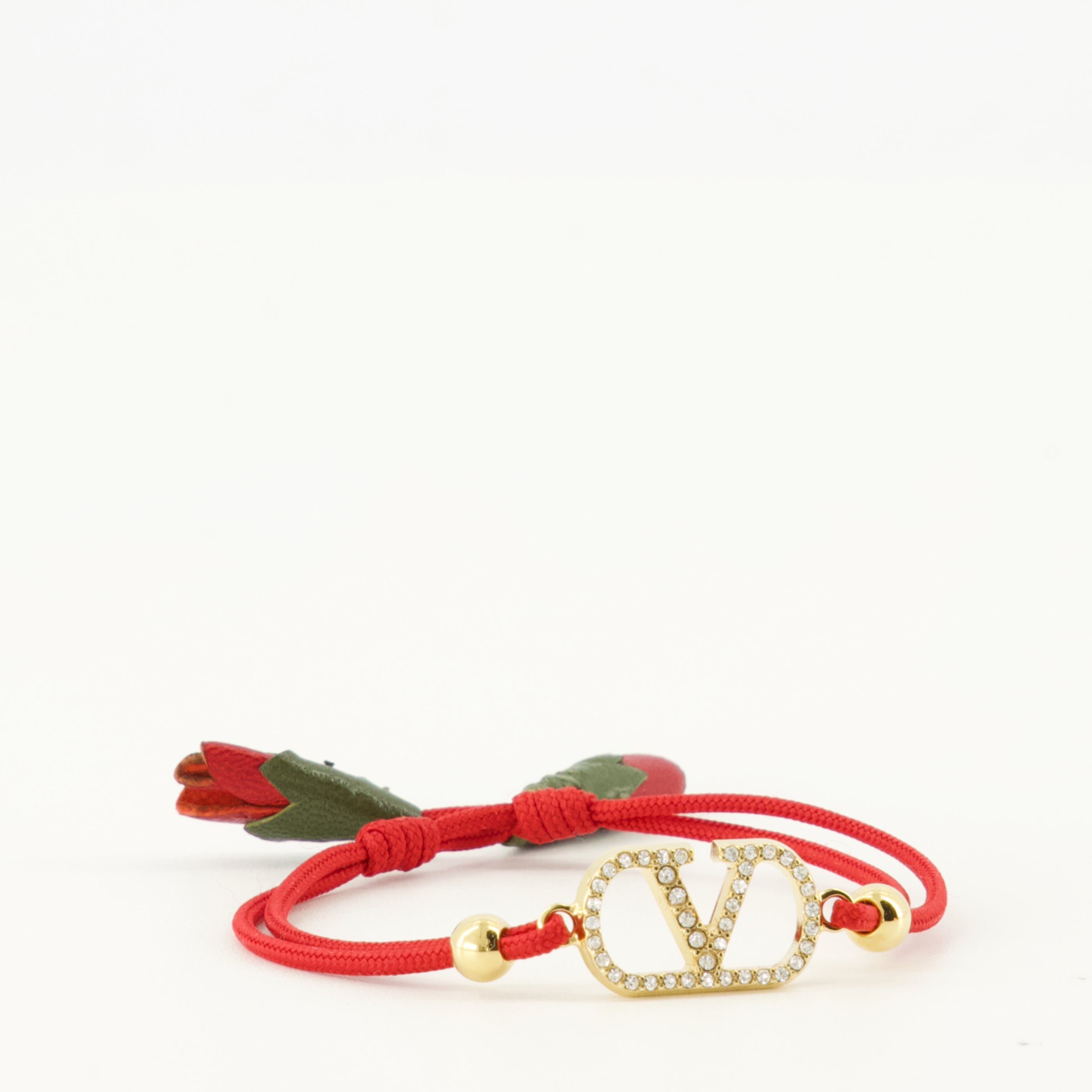 Image of the Vlogo bracelet with red cord by Valentino Garavani for Women - Spring-Summer 2026 - Detailed View_2
