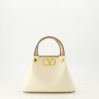 Imagem da mini bolsa tote bege da marca Valentino Garavani para Senhora - Coleção Primavera-Verão 2026 - Vista Frontal