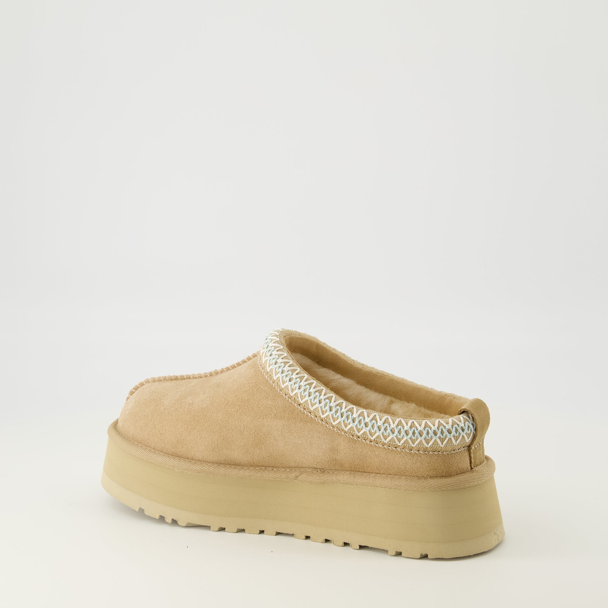 Image de l'article Mules Tazz II de la marque Ugg pour Femme - Saison Automne-Hiver 2025 - Vue trois quarts arrière droite