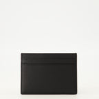 Image de l'article Portes-cartes Tiny Cassandre en cuir noir de la marque Saint Laurent pour Homme - Saison Printemps-Été 2026 - Vue de Dos