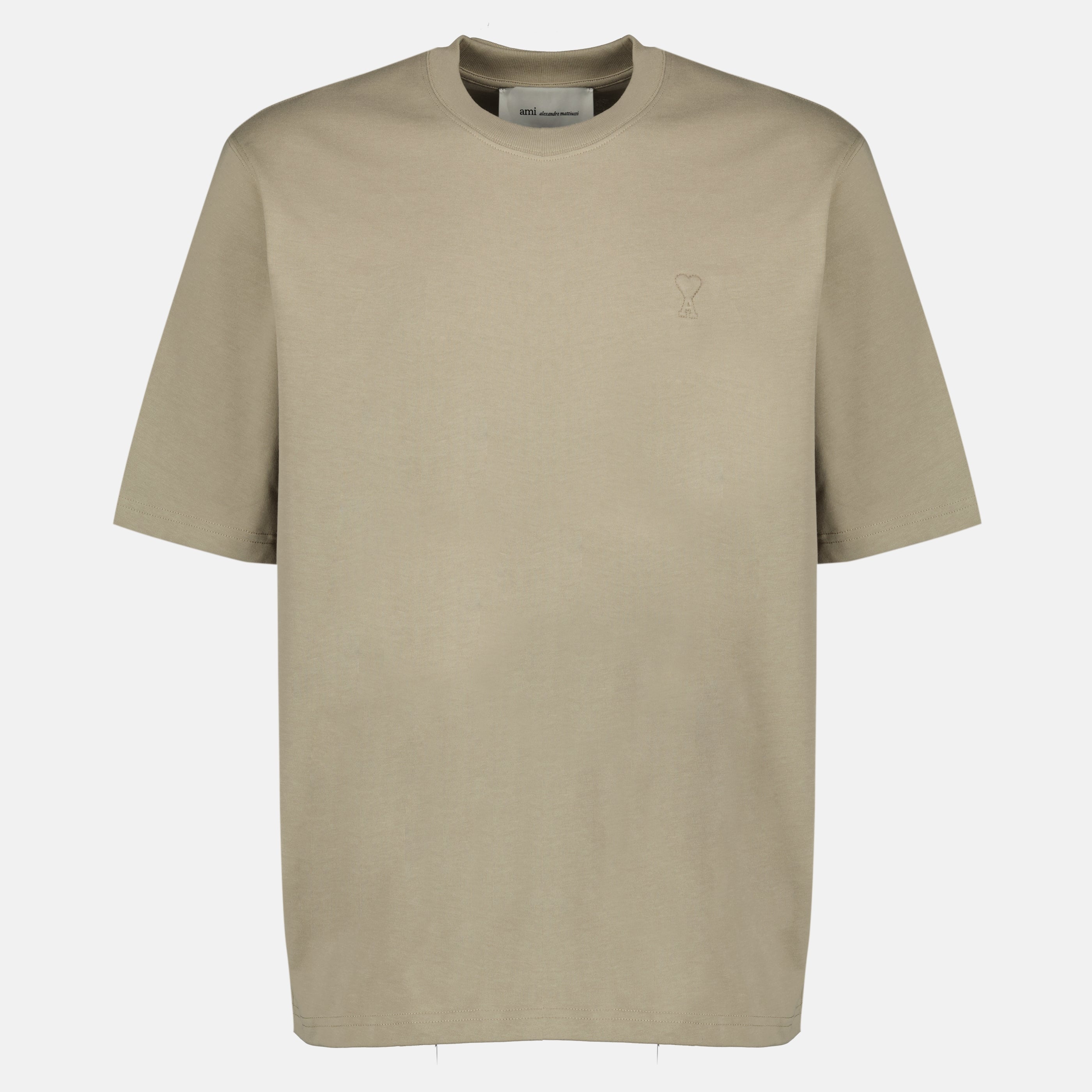 Image of the article Beige AMI Heart Cotton T-shirt from the brand Ami PARIS for Unisex - Spring-Summer 2026 Season - Front View