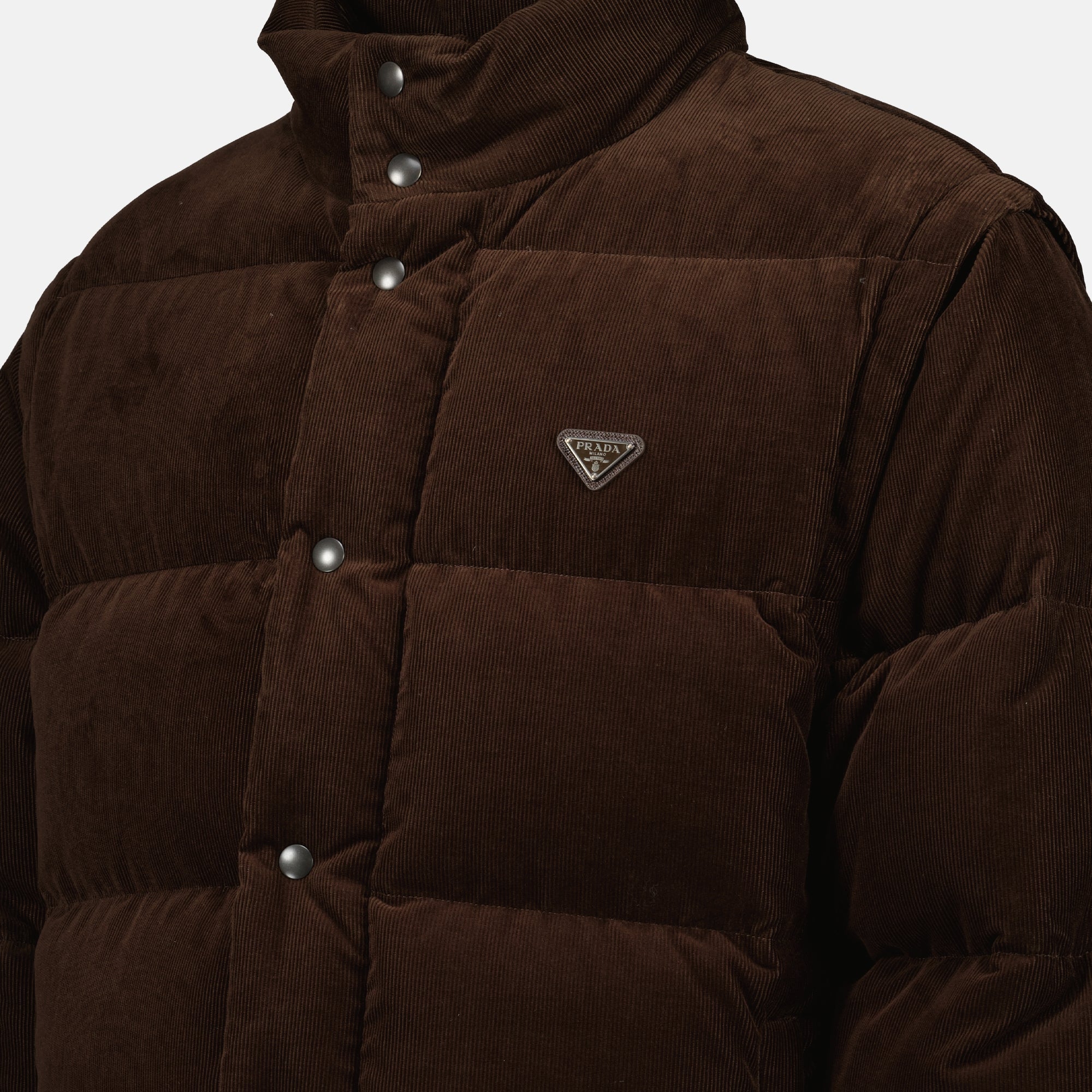 Image of the brown corduroy puffer jacket from Prada for Men - Autumn-Winter 2025 - Detailed View_3
