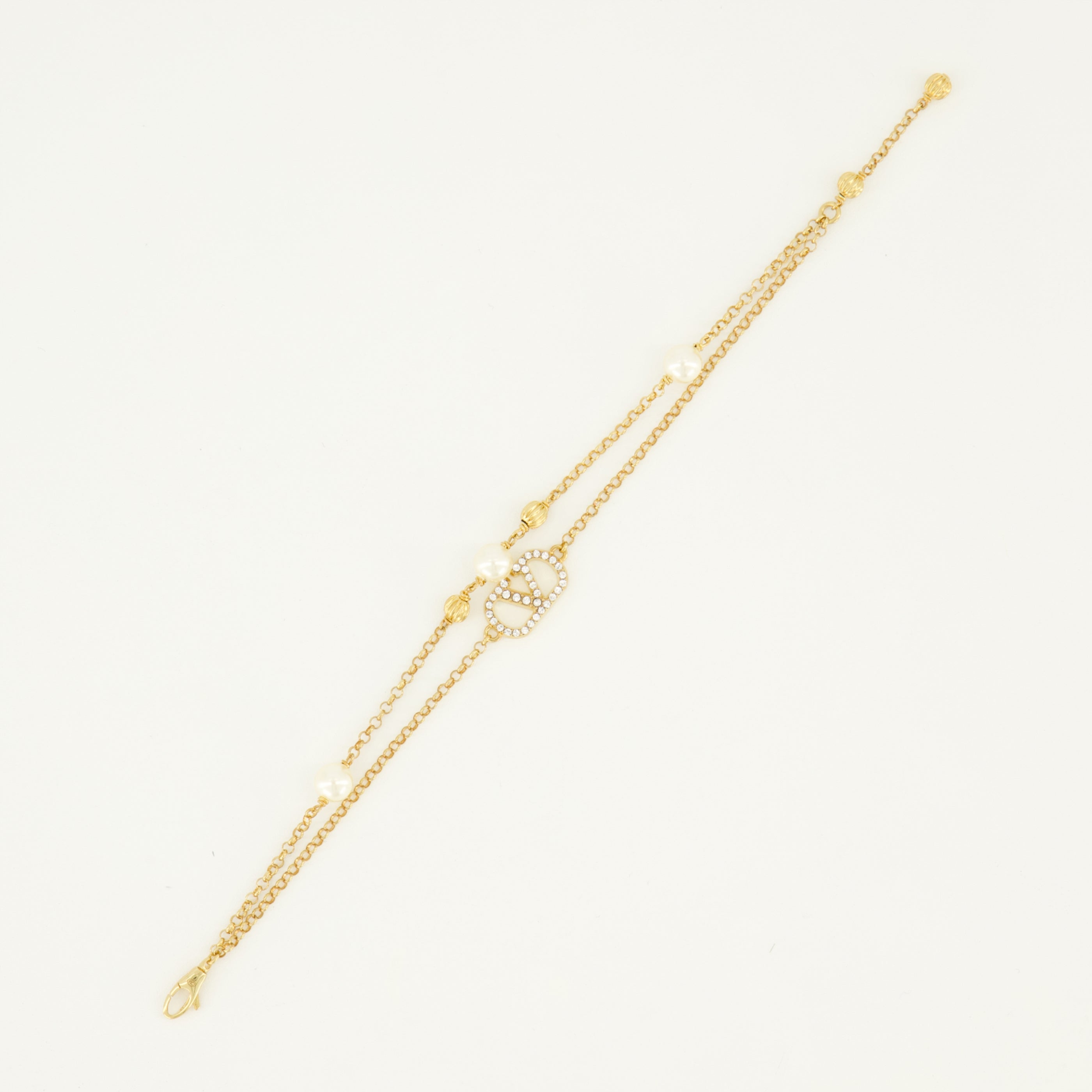 Bijoux Bracelet VLogo avec perles et cristaux Swarovski® doré Valentino Garavani Doré Femme
