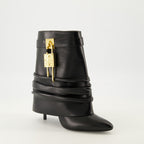 Imagen de las botas tobilleras Shark Lock de Givenchy para mujer - Temporada Otoño-Invierno 2025 - Vista tres cuartos frontal derecha