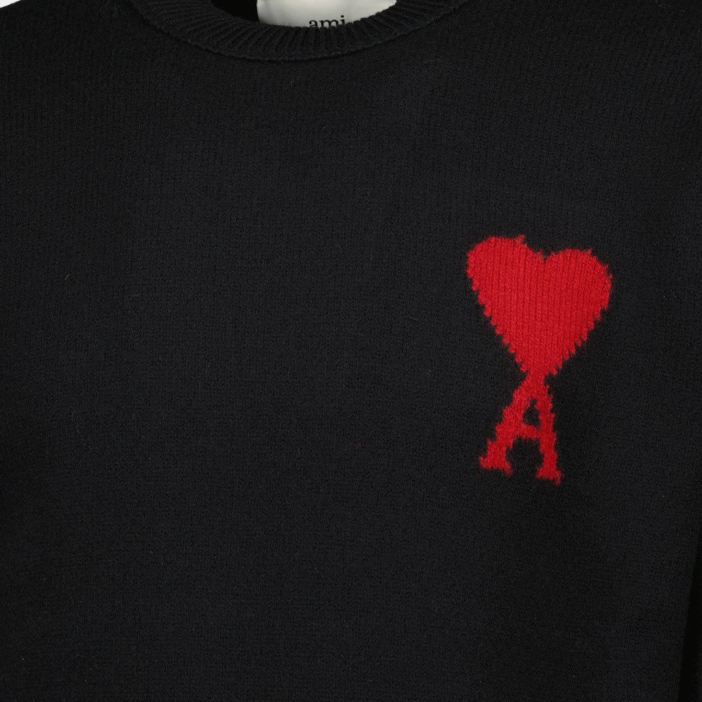 Image of the AMI black heart sweater from the brand Ami PARIS for Unisex - Spring-Summer Season 2026 - Detailed View_1