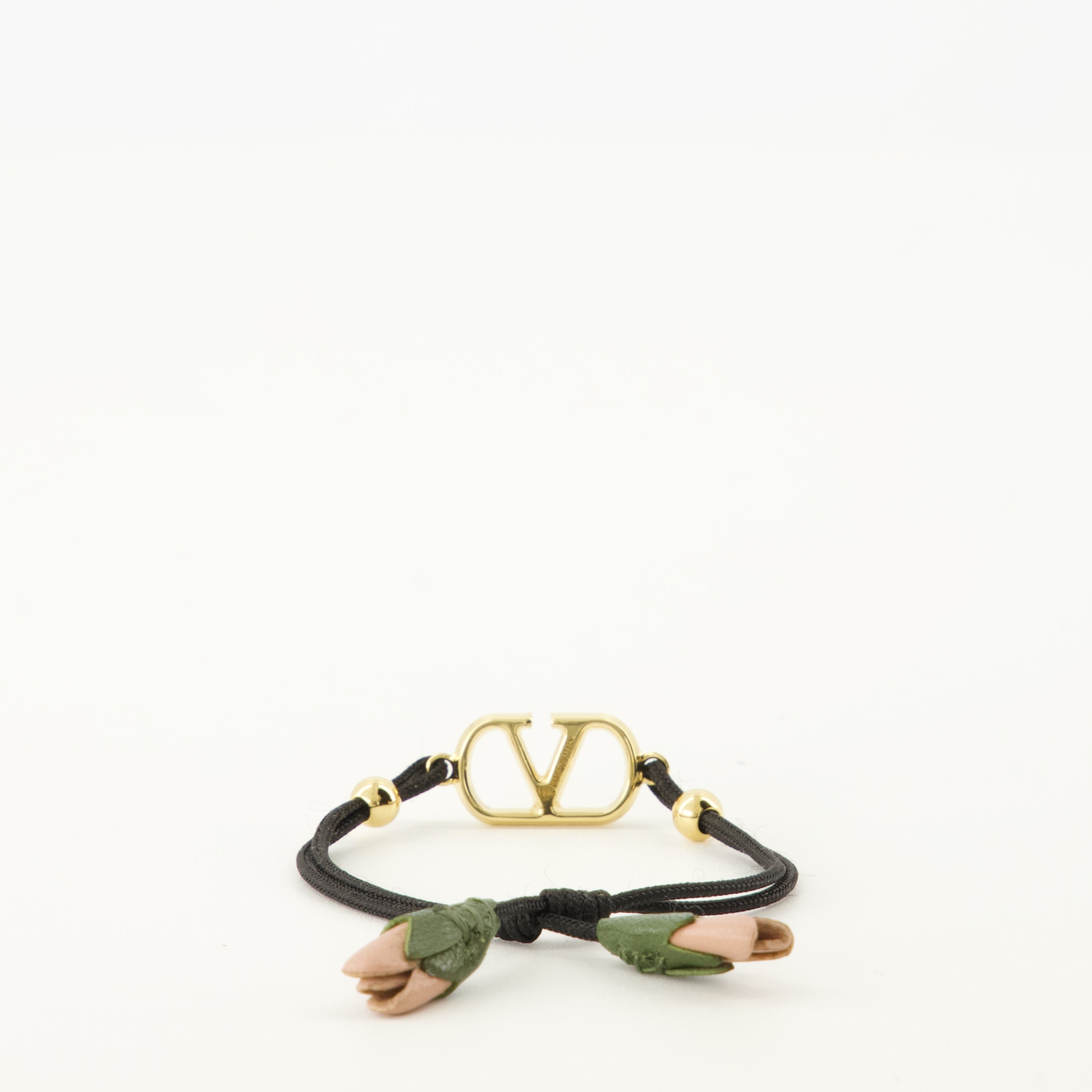 Image of the Vlogo bracelet with black cord from the brand Valentino Garavani for Women - Spring-Summer 2026 - Back View