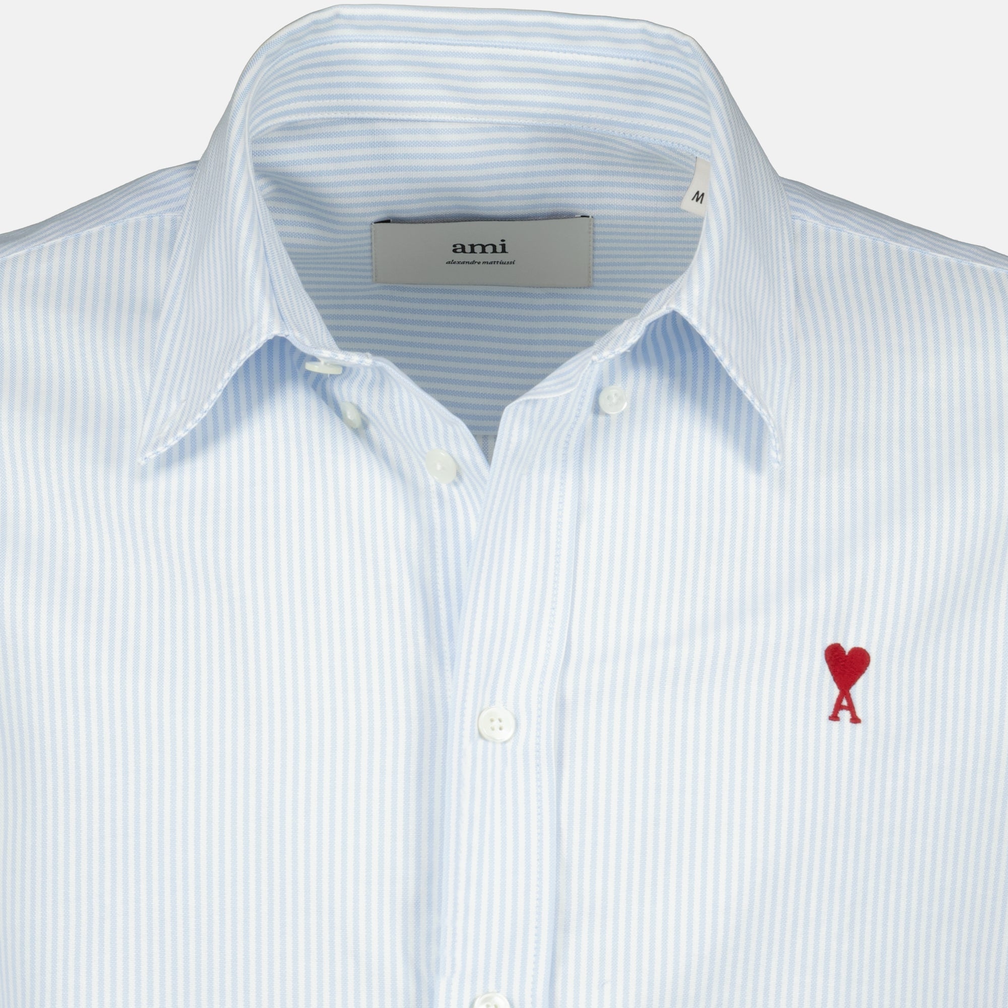 Image of the blue striped Ami heart shirt by the brand Ami PARIS for Unisex - Autumn-Winter 2025 - Detailed View_2