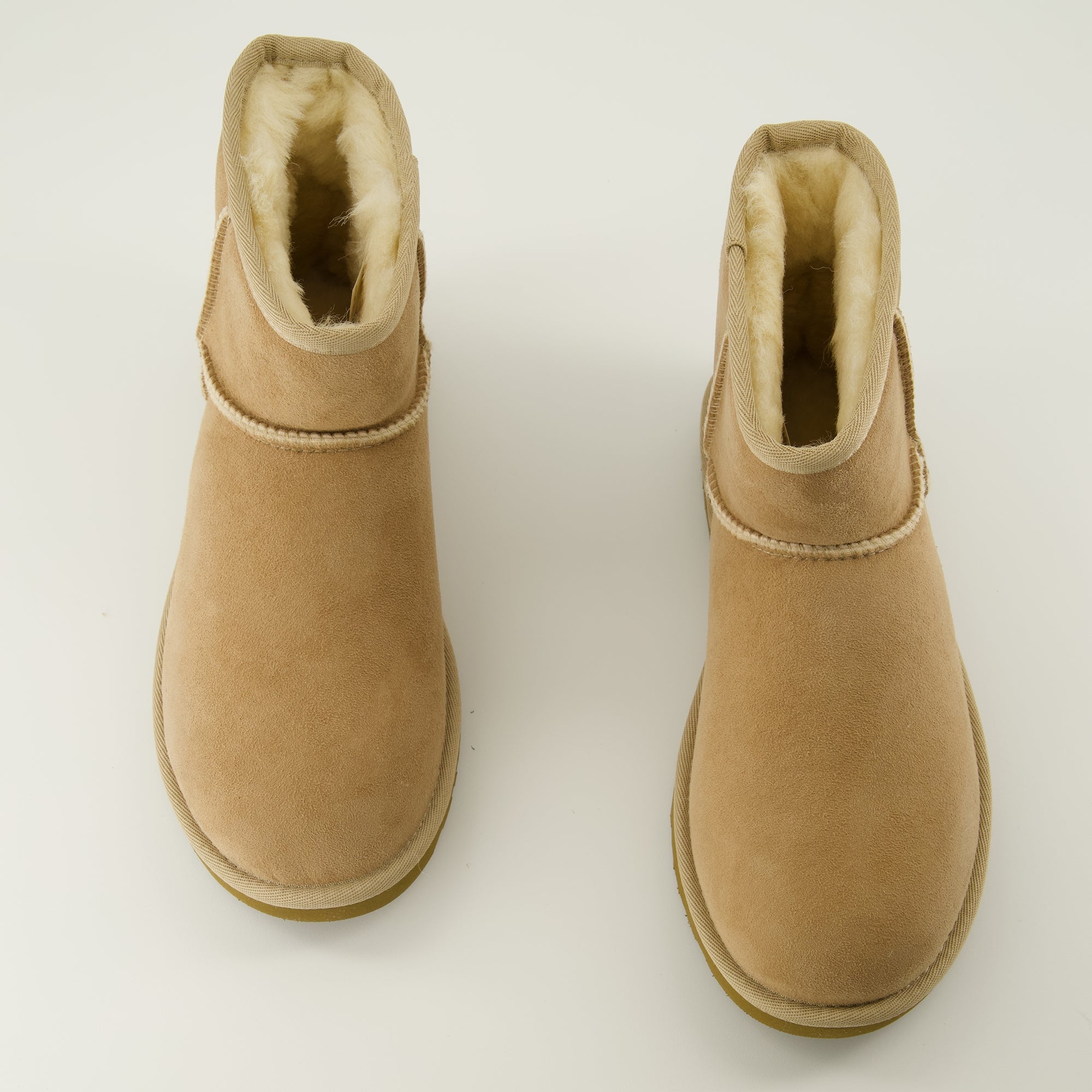 Image of the Ugg Classic Mini II beige ankle boots for women - Spring-Summer 2026 season - Top view of pair of shoes