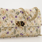 Sacs à main et épaule 록스탯 스파이크 클러치 Valentino Garavani Multicolore Femme