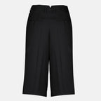 Image of the black wool Bermuda shorts from the brand Ami PARIS for Women - Spring-Summer Season 2026 - Back View