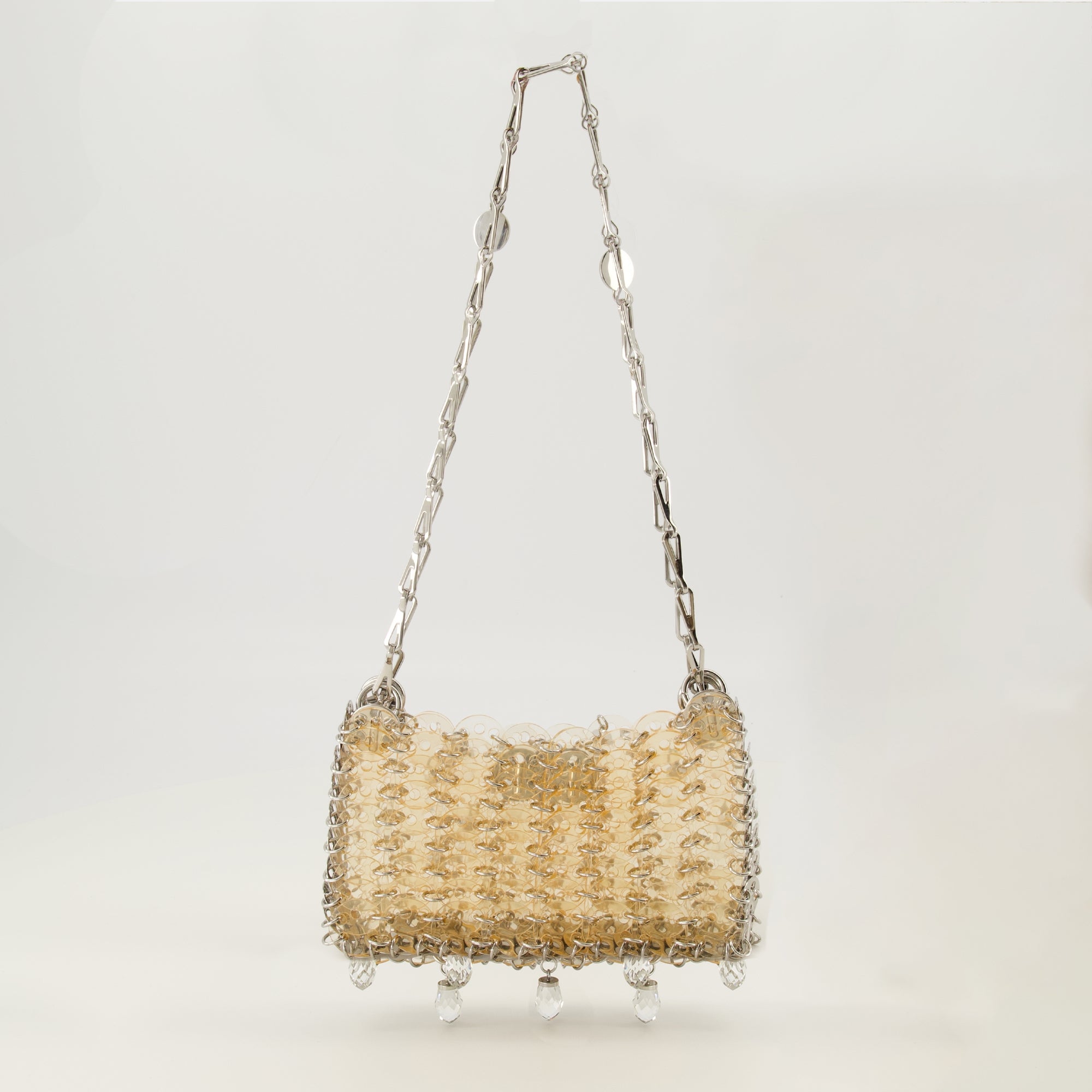 Image of the 1969 nano bag with golden crystals from the brand Rabanne for Women - Spring-Summer 2026 - Back View