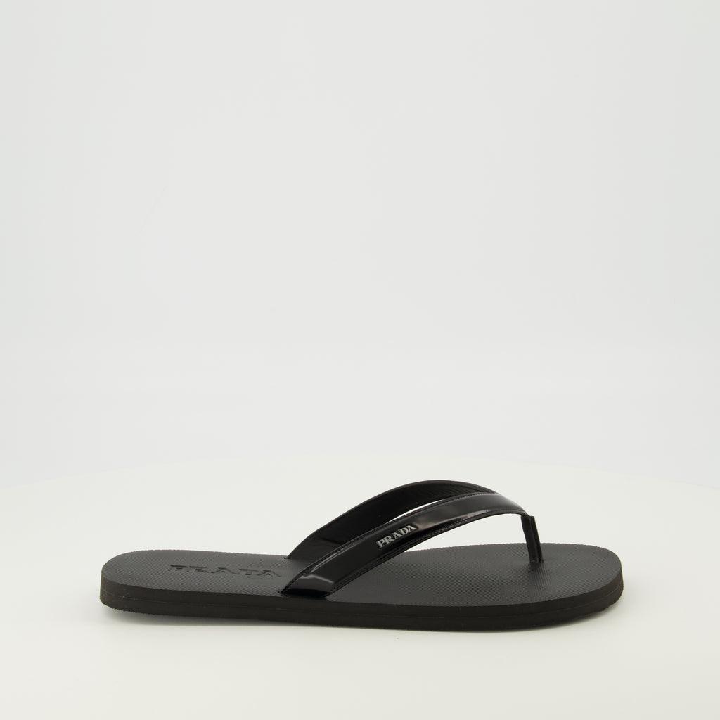 Image of the article Black brushed leather flip flops by Prada for Men - Spring-Summer 2026 - Right side view