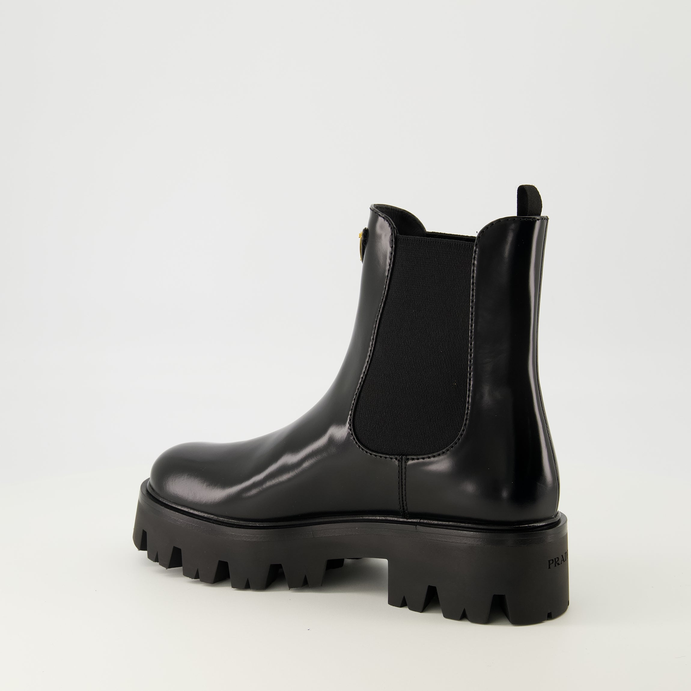 Image de l'article Bottines en cuir de la marque Prada pour Femme - Saison Automne-Hiver 2025 - Vue trois quarts arrière droite