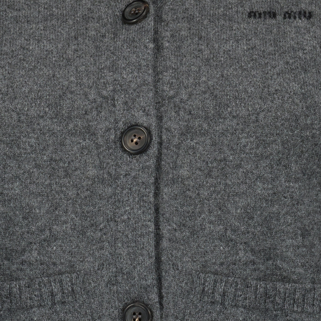 Image of the Miu Miu Women's Sleeveless Grey Wool Cardigan - Spring-Summer 2026 - Detailed View_2