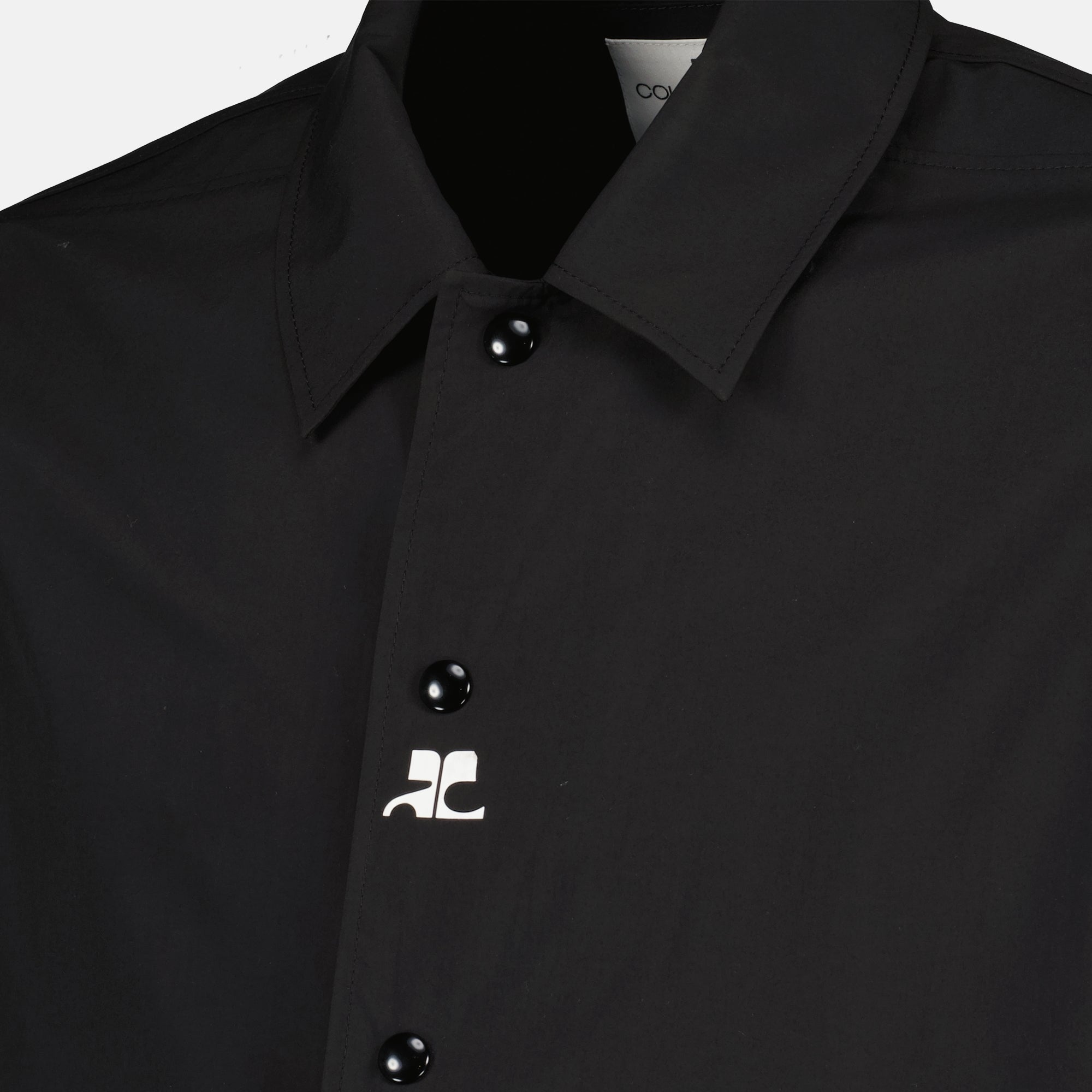 Image of the 'Courrèges' black Coach jacket for men - Spring-Summer 2026 - Detailed view 1