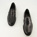 Imagen de los mocasines de cuero para hombre de Tod's - Temporada Otoño-Invierno 2025 - Vista de cima do par de zapatos