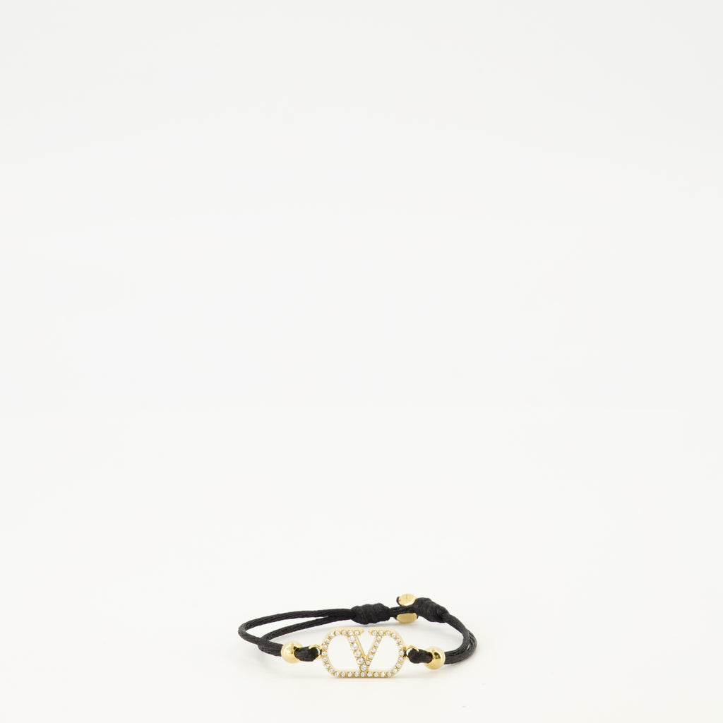 Immagine del bracciale Vlogo con cordino nero e cristalli Swarovski® del marchio Valentino Garavani per donna - Primavera-Estate 2026 - Vista Frontale