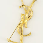 Immagine della spilla in metallo dorato a forma di coccodrillo Cassandre del marchio Saint Laurent per Unisex - Stagione Primavera-Estate 2026 - Vista Dettagliata_3