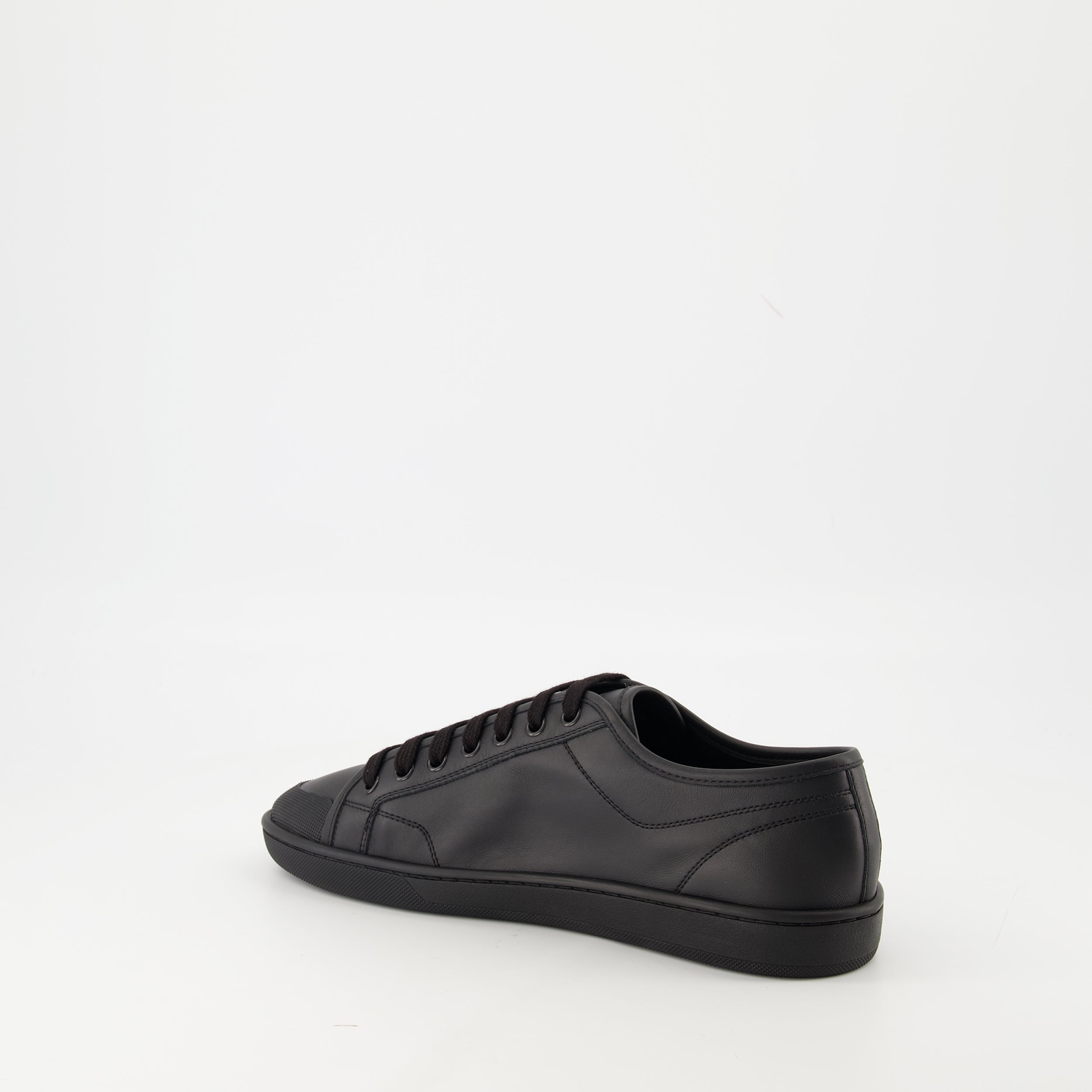 Image of the Saint Laurent Men's Gym Sneakers - Fall/Winter 2025 - Three-quarter back right view