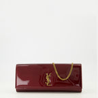 Image of the Saint Laurent Kate Clutch bag in burgundy patent leather for Women - Autumn-Winter 2025 Season - Front View