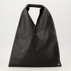 Imagen del bolso japonés negro de la marca Mm6 para Mujer - Temporada Primavera-Verano 2026 - Vista Frontal
