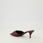 Imagen de las mules de tacón Babylone en burdeos de la marca Saint Laurent para Mujeres - Temporada Primavera-Verano 2026 - Vista tres cuartos trasera derecha