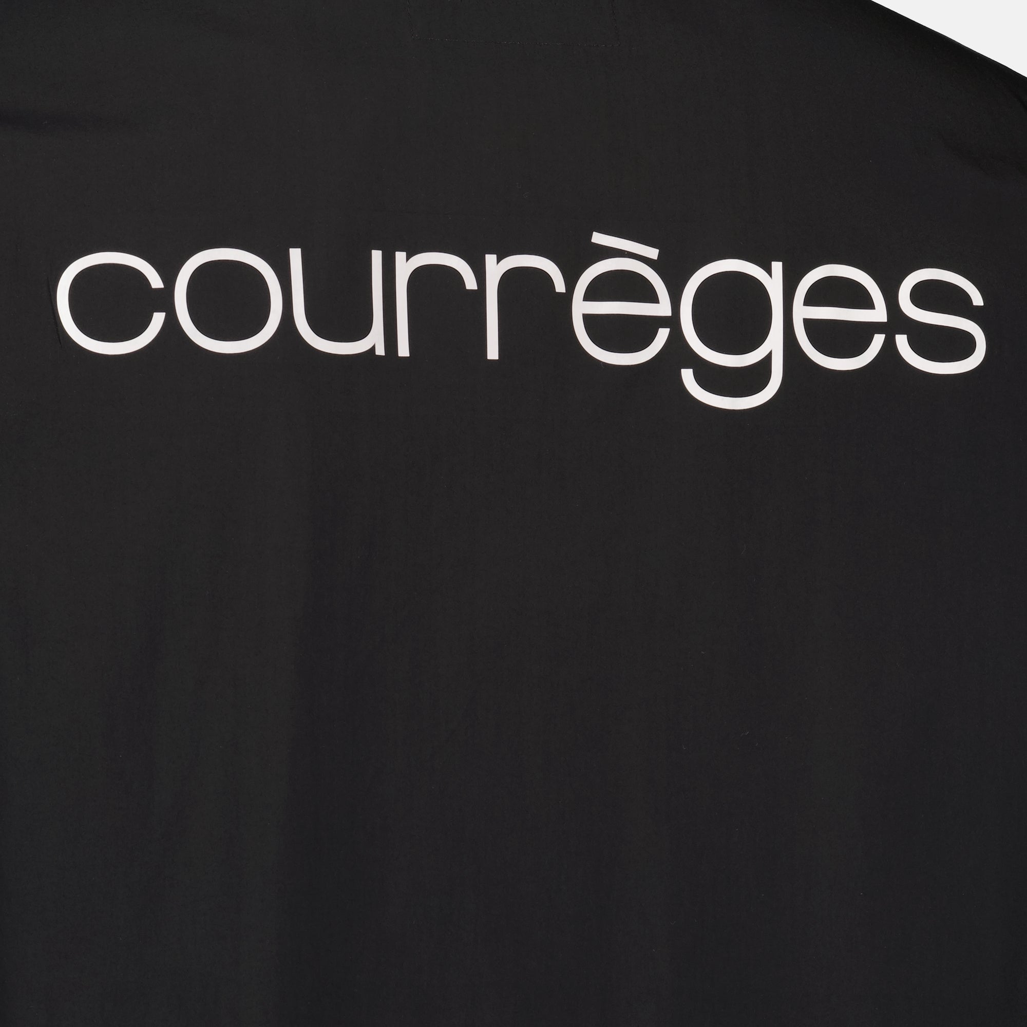Image of the 'Courrèges' black Coach jacket for men - Spring-Summer 2026 - Detailed view 2