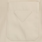 Image of the beige cotton zip-up shirt jacket by Prada for Men - Spring-Summer 2026 - Detailed View_1