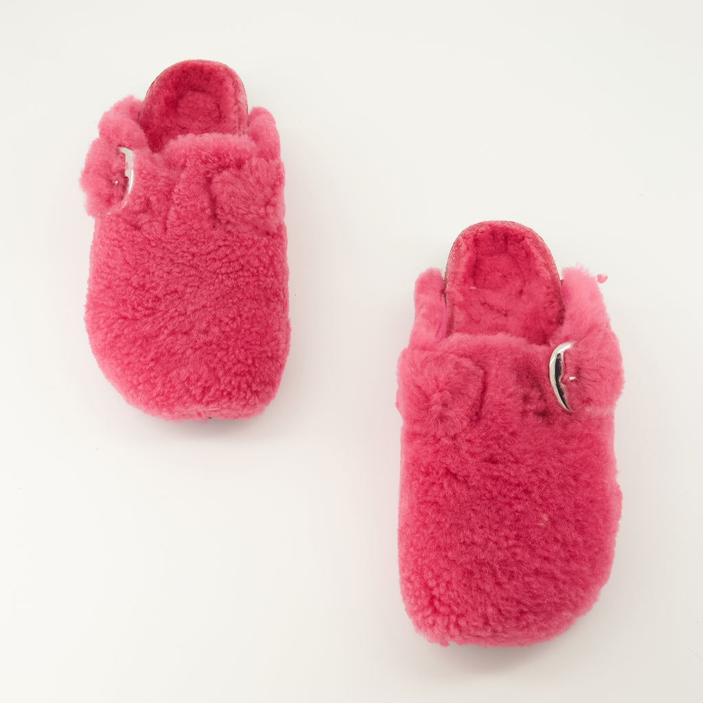 Image de l'article Mules Boston en teddy rose de la marque Birkenstock pour Femme - Saison Printemps-Été 2026 - Vue de dessus paire de chaussure