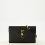 Sacs à main et épaule Cassandre Geldbörse mit schwarzem, genarbtem Leder und Kette Saint Laurent Noir Femme
