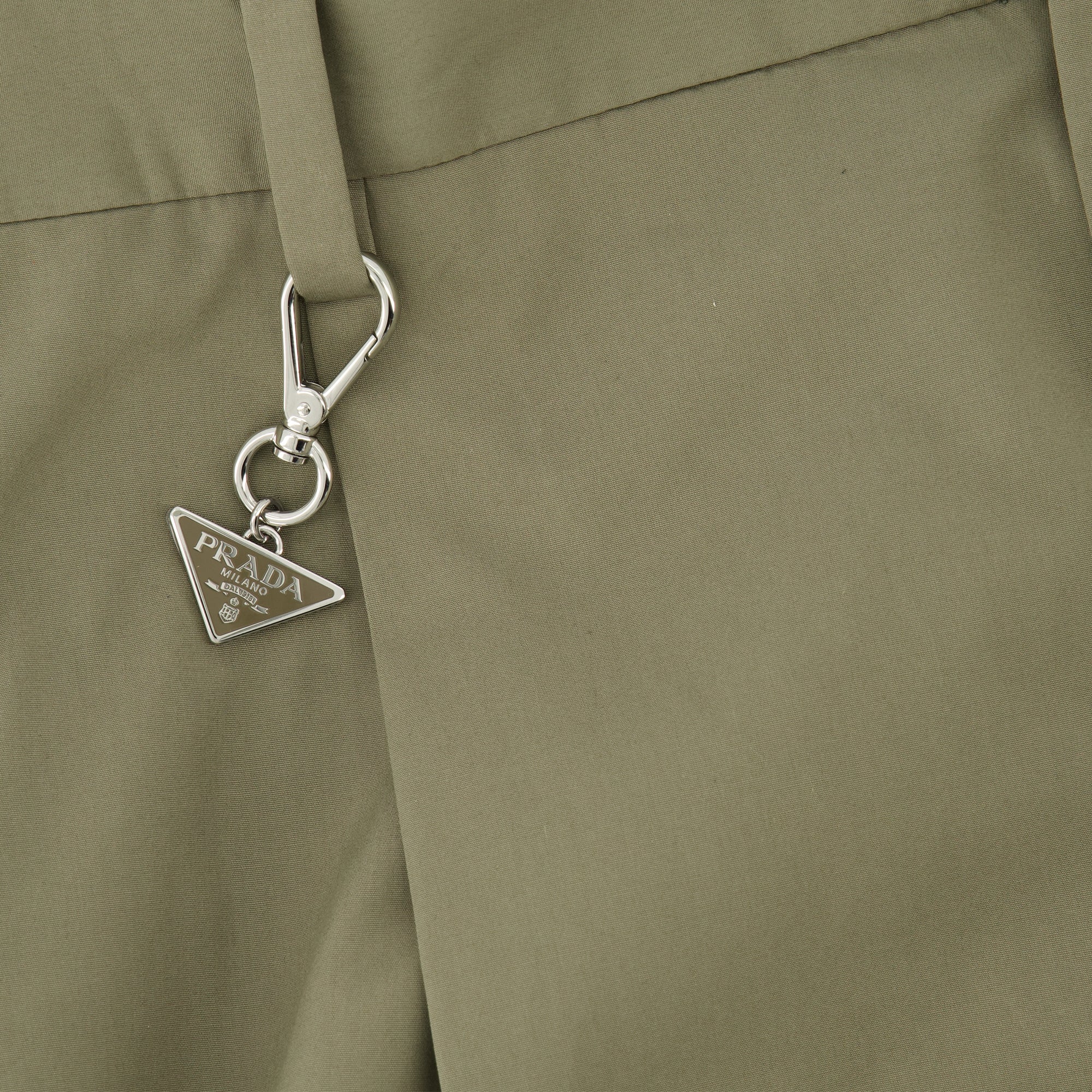 Image of the beige dress pants from the brand Prada for Men - Spring-Summer 2026 - Detailed View_1