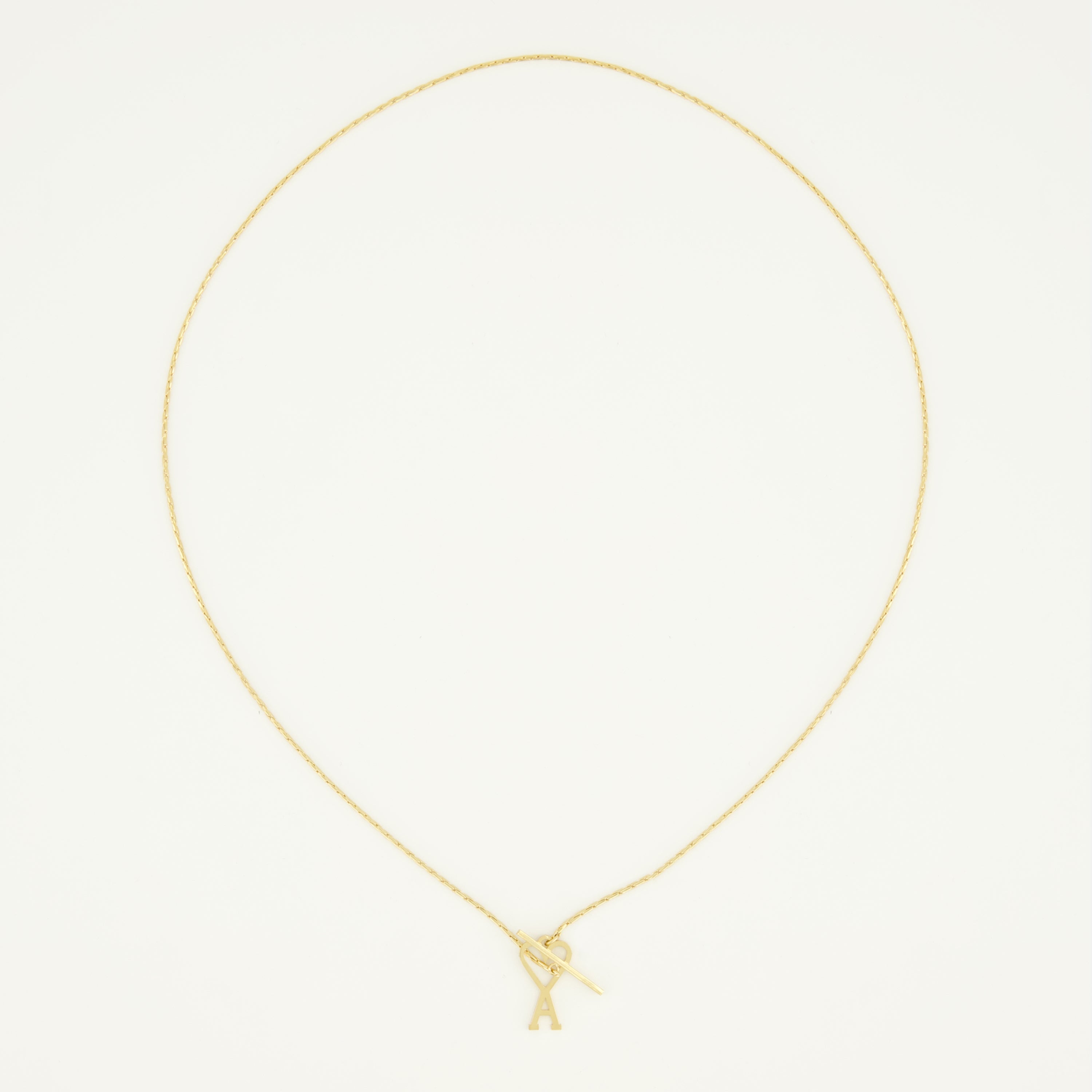 Image of the AMI golden heart necklace from the brand Ami PARIS for Unisex - Spring-Summer 2026 - Back View