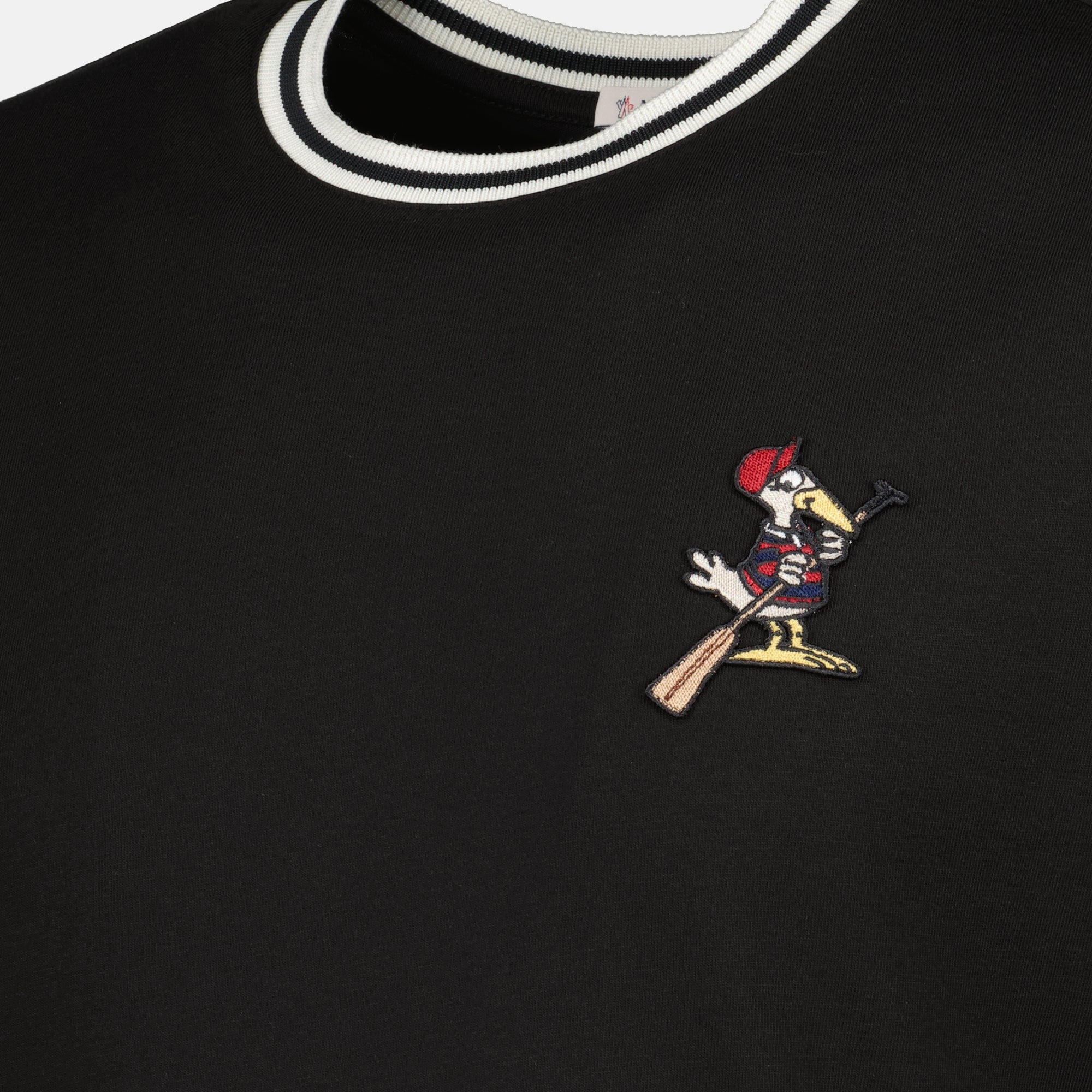 Image of the MonDuck black T-shirt by Moncler for Men - Spring-Summer 2026 - Detailed View_1