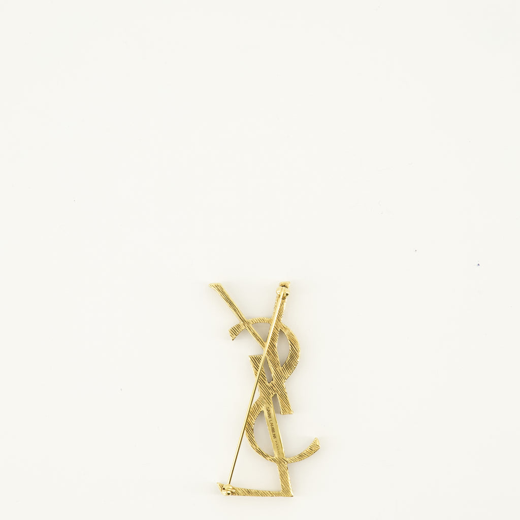 Image of the Saint Laurent Cassandre gold brass brooch for Women - Spring-Summer 2026 - Back View