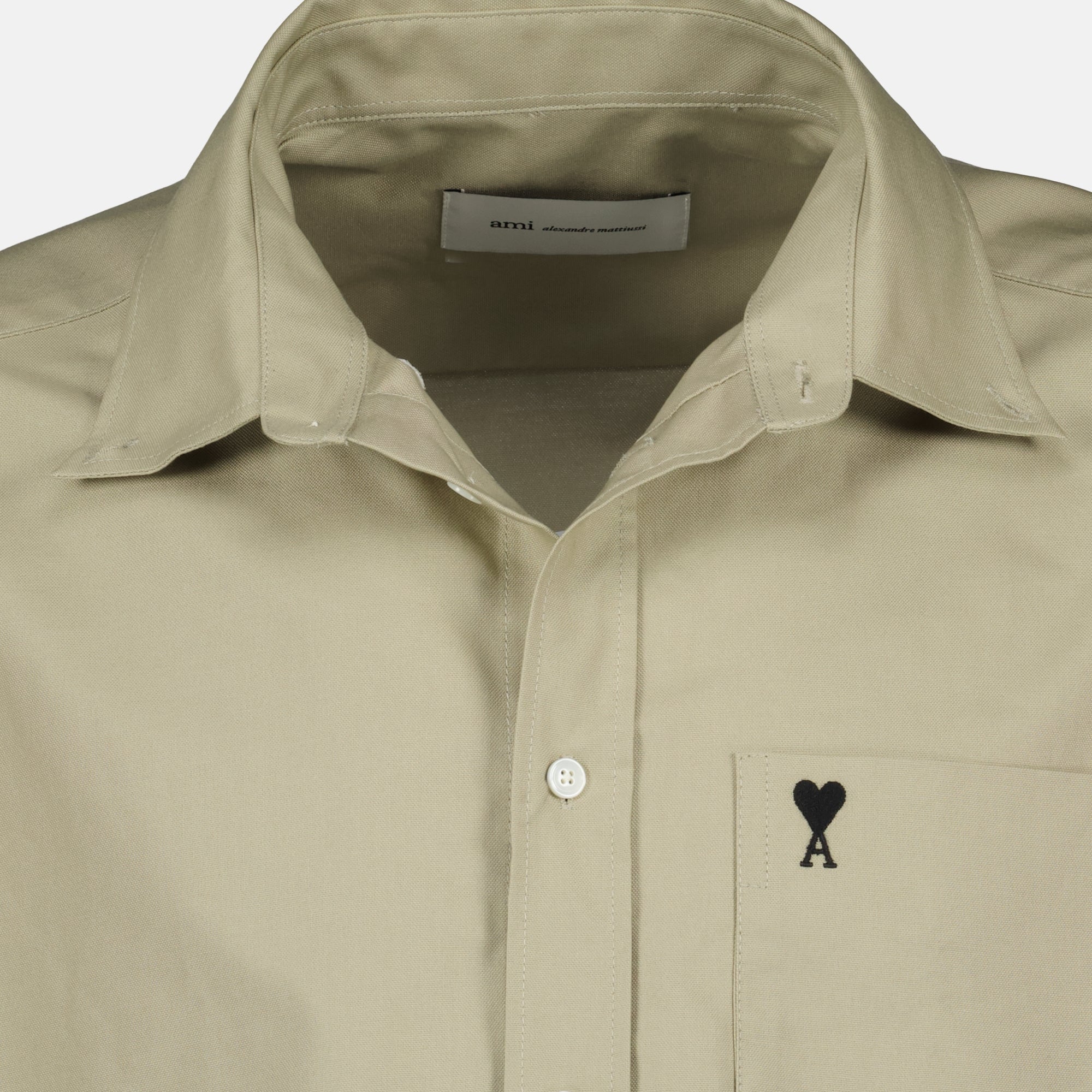 Image of the AMI heart beige boxy shirt by Ami PARIS for Men - Spring-Summer 2026 - Detailed View_1