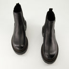 Bottes et bottines Bottines en cuir Prada Noir Homme