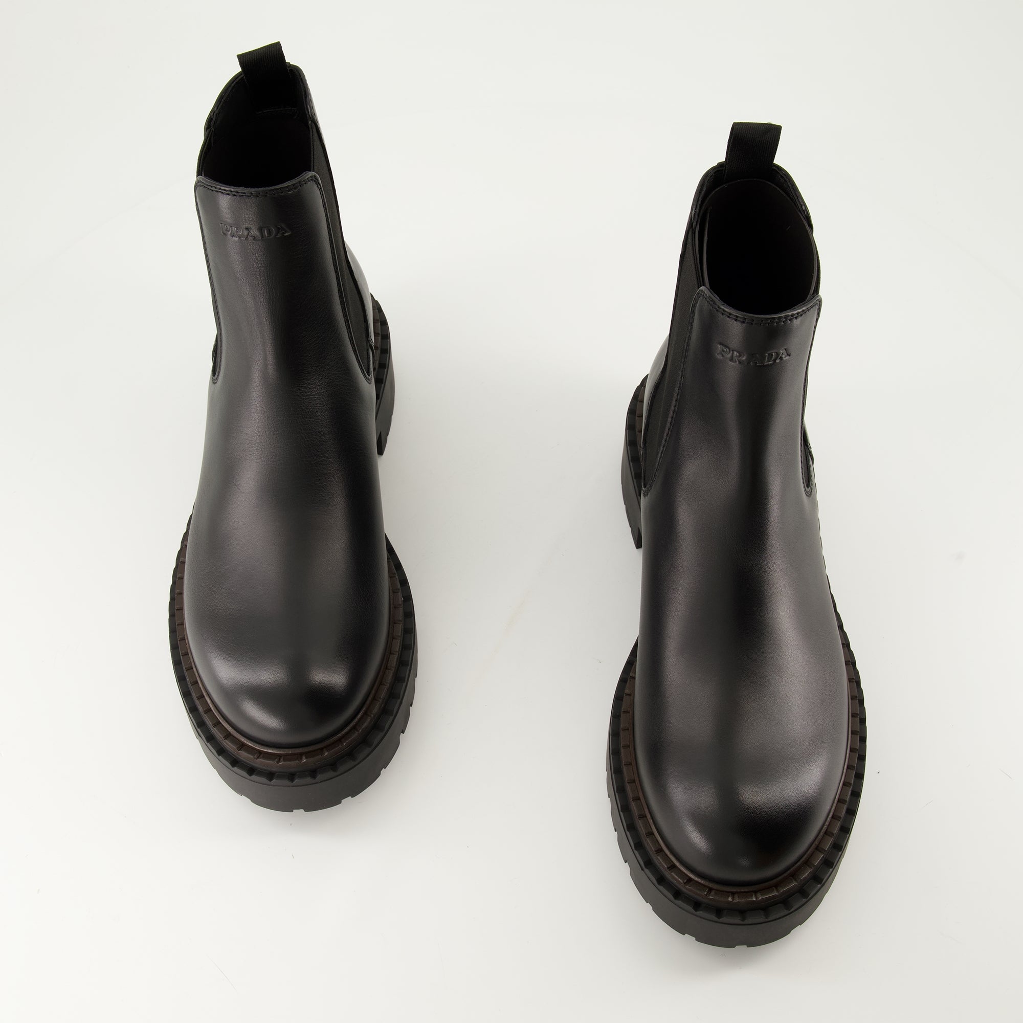 Bottes et bottines Bottines en cuir Prada Noir Homme